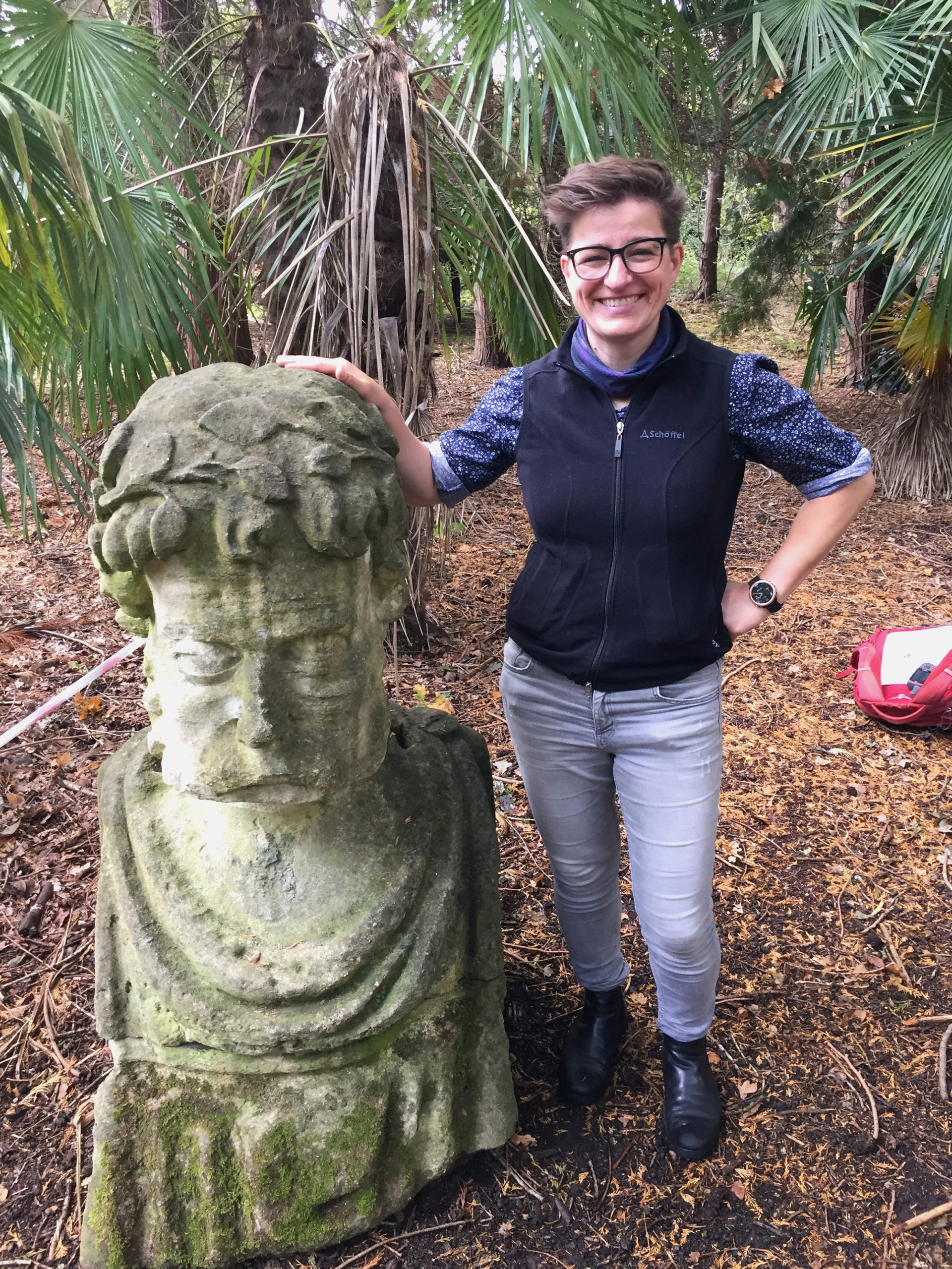 Katrin in Harcourt Arboretum next to a 2nd generation Sheldonian Head, Oxford 2019.